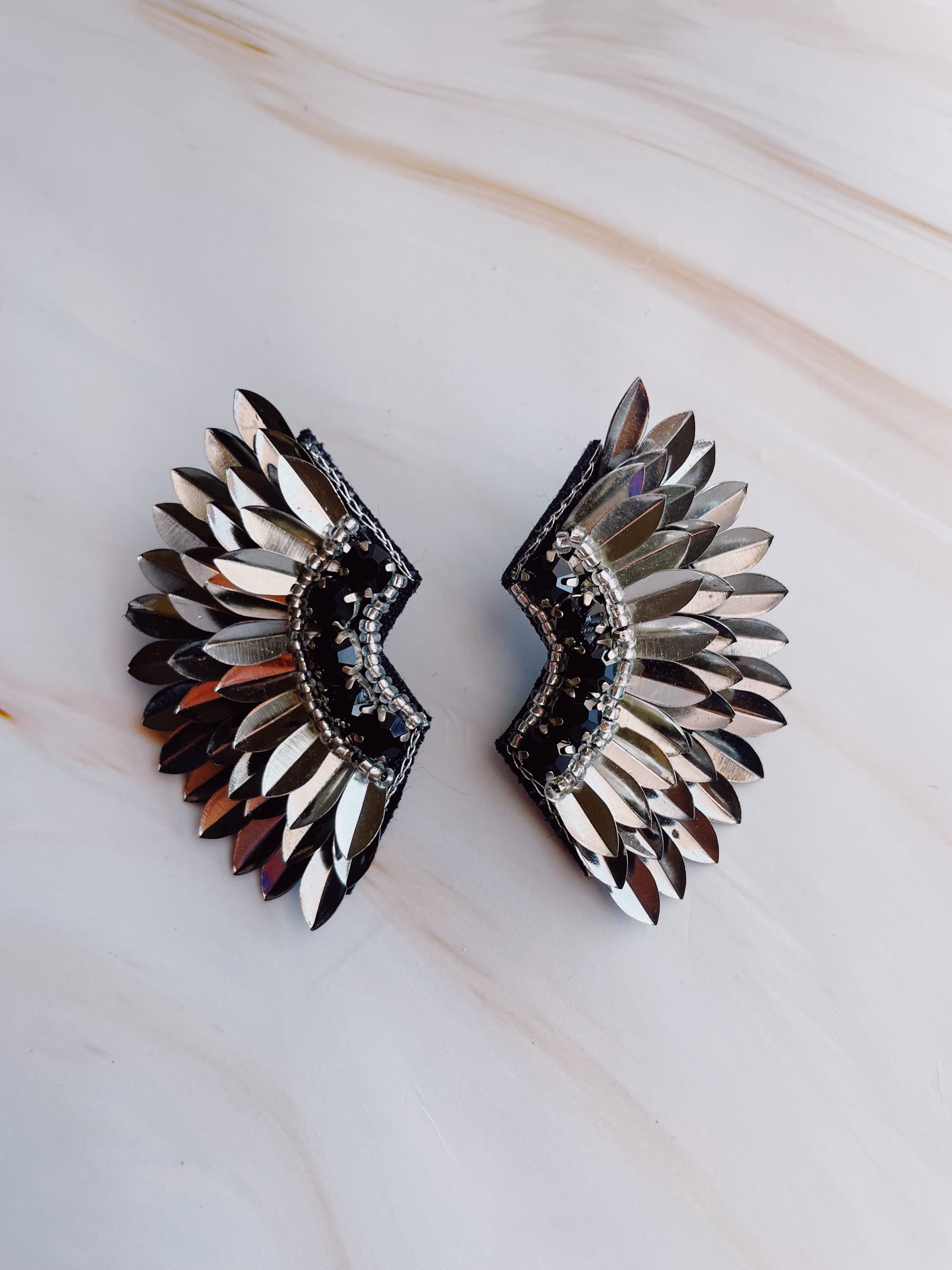 silver winged earrings